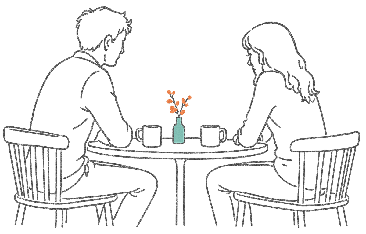 Line drawing of a couple sitting quietly either side of a small table
